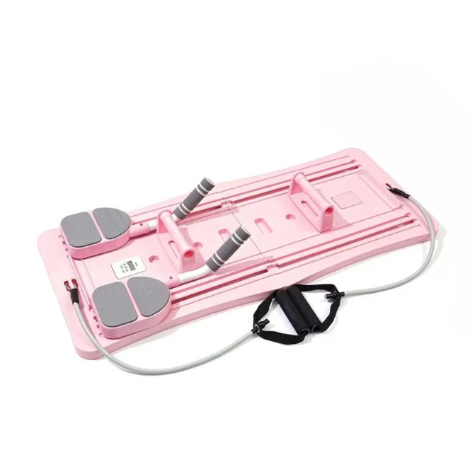 Blush Pink foldable pilates slider board with foot pads, resistance bands and hand weights