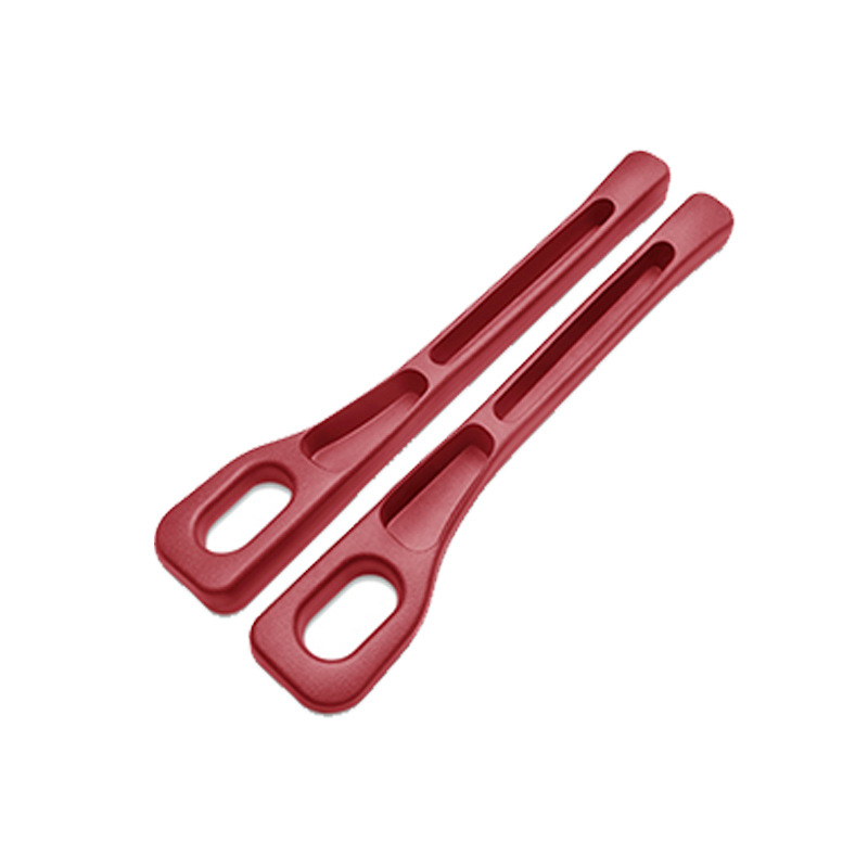Pair of red CHICAMOR SeatSlot car seat gap fillers on a white background