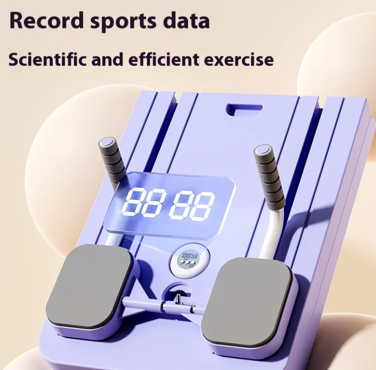 Purple abdominal board with a lit digital display and foot pads, close-up