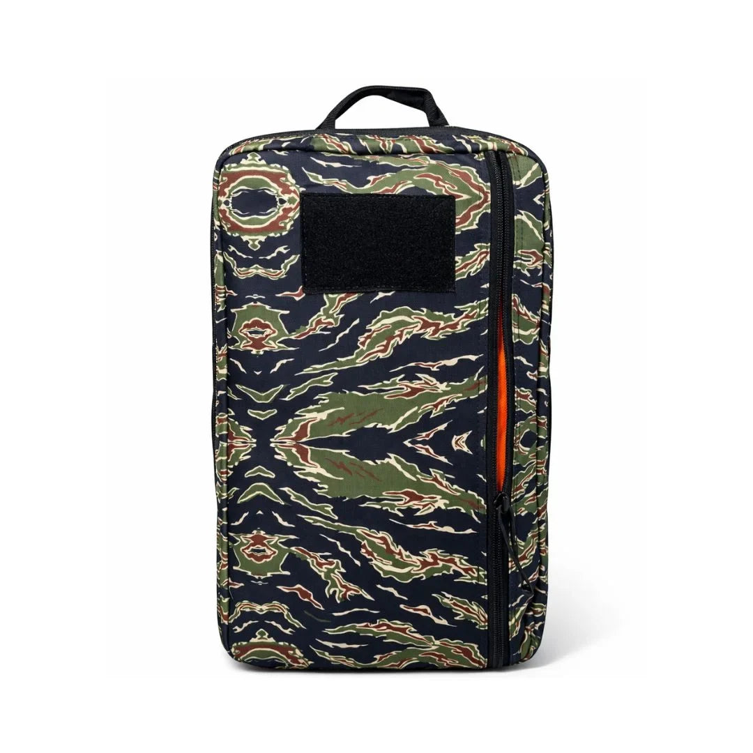 Recycled Firefighter 24 Hour Backpack in green and black tiger stripe camouflage with a black patch panel and orange zipper edge
