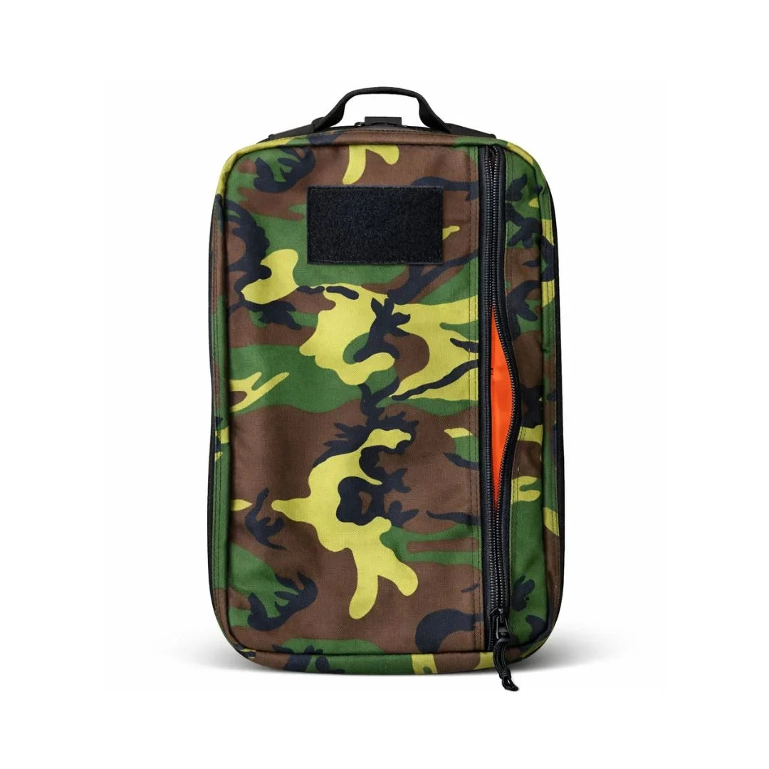 Recycled Firefighter 24 Hour Backpack in green, brown and black woodland camouflage with an orange zipper edge