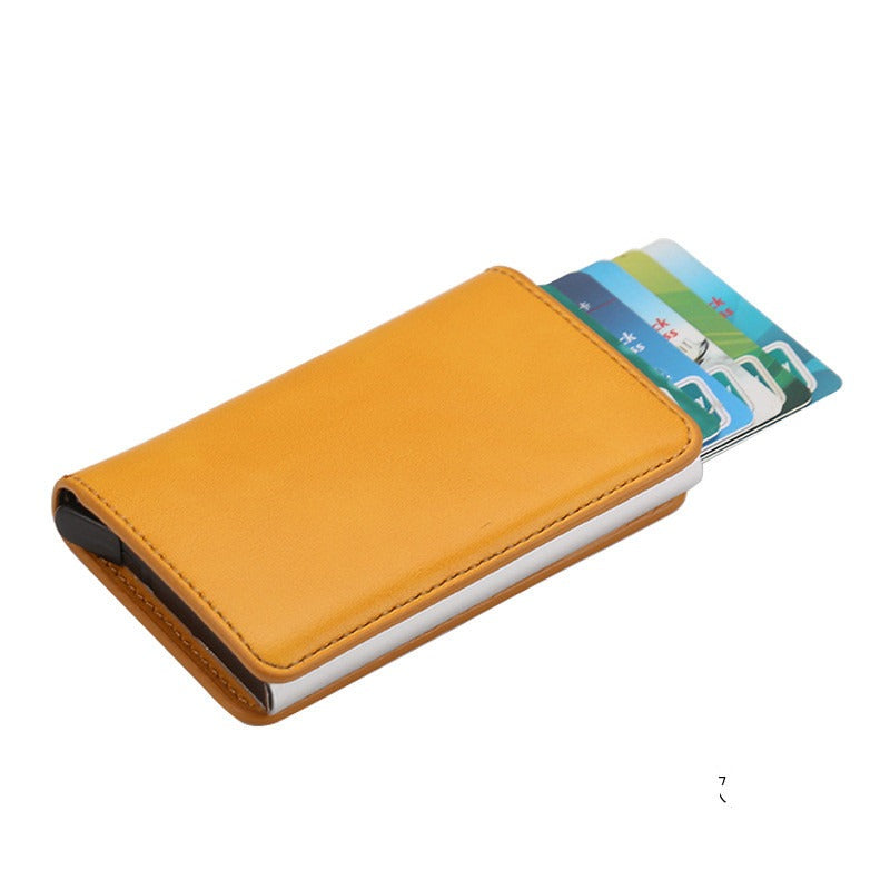 CHICAMOR RFID pop-up card wallet in amber yellow with cards fanned out