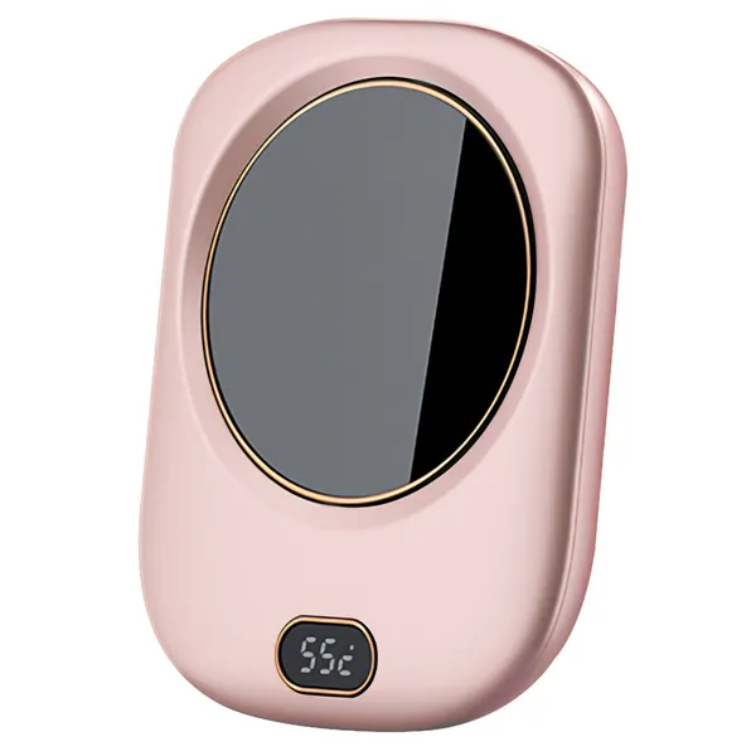 Pink mug warmer with a round heating surface and a temperature display