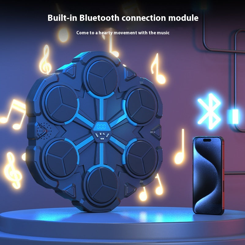 Hexagonal boxing target machine with glowing blue lights beside a phone showing Bluetooth, with musical notes