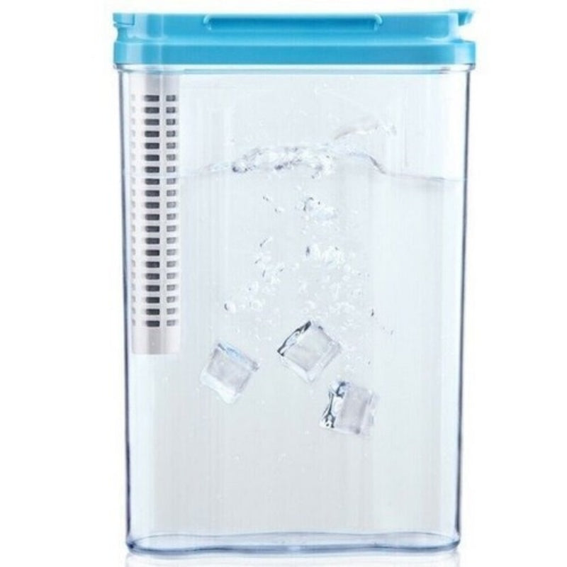 Clear water pitcher filled with water and ice cubes with a blue lid