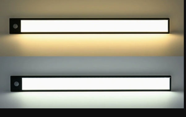 Two black motion sensor light bars glowing warm white and cool white
