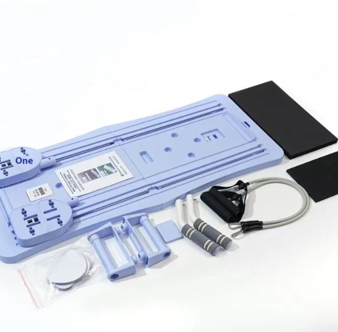 Soft Lavender foldable pilates slider board with foot pads, bands and weights, top view