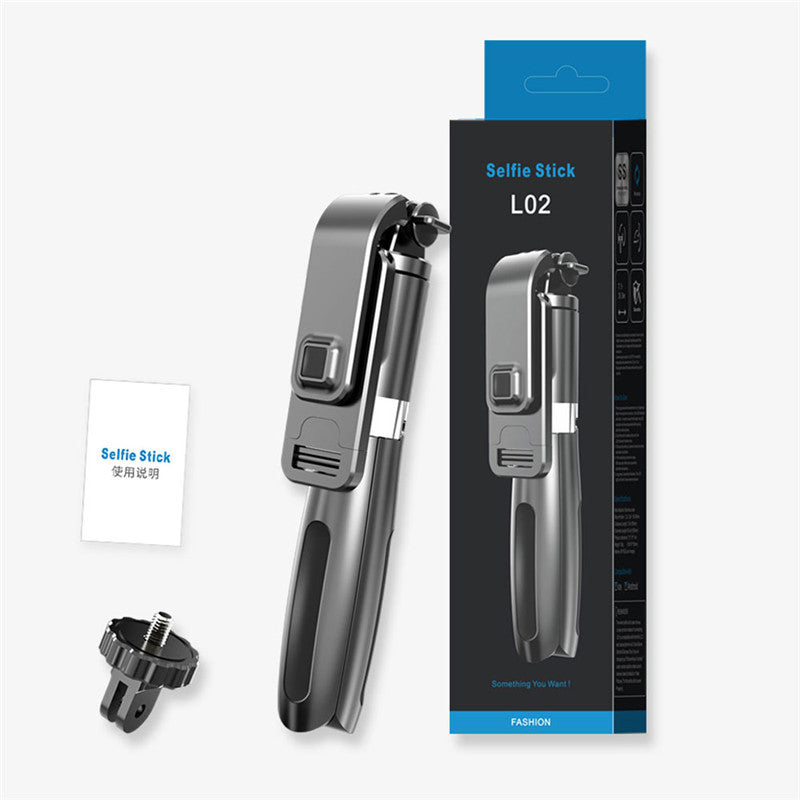 Selfie stick tripod beside its retail box and a spare mount