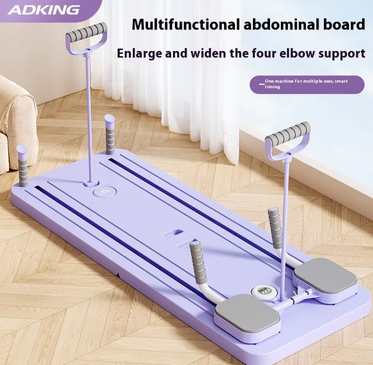 Purple abdominal board with foot pads and cord handles on a wood floor