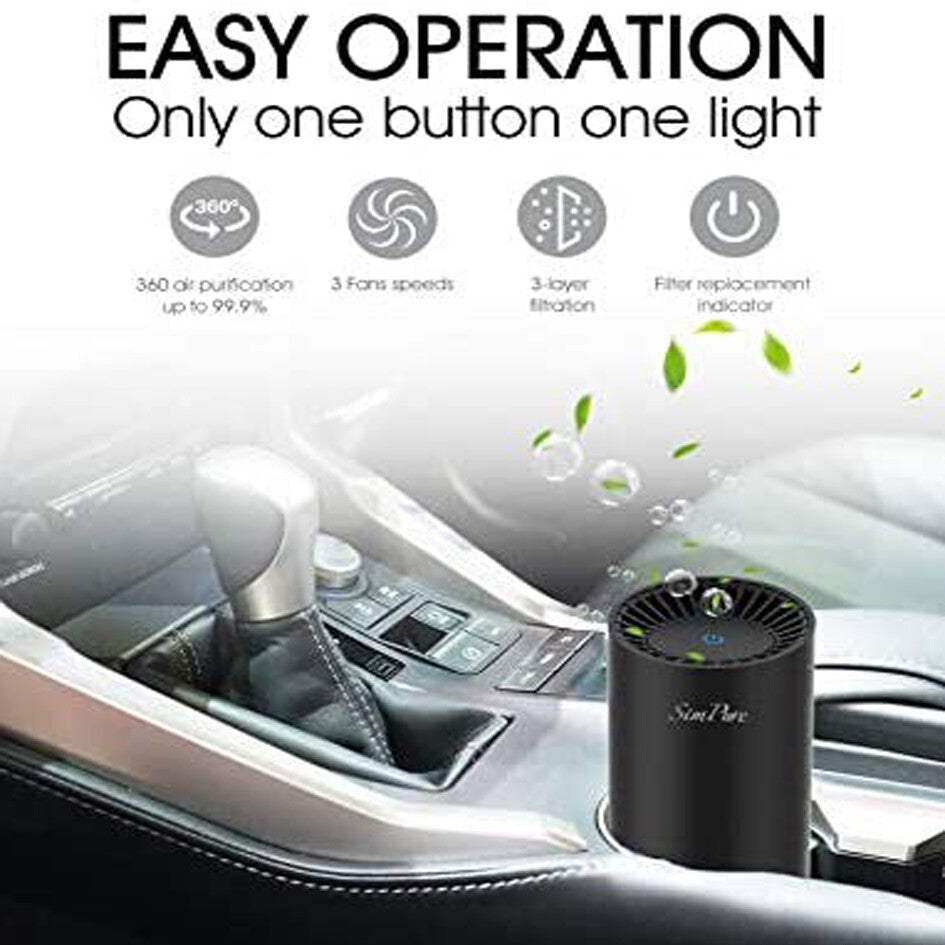 Black air purifier in a car cup holder beside a gear shift, with the text Easy Operation, one button, one light