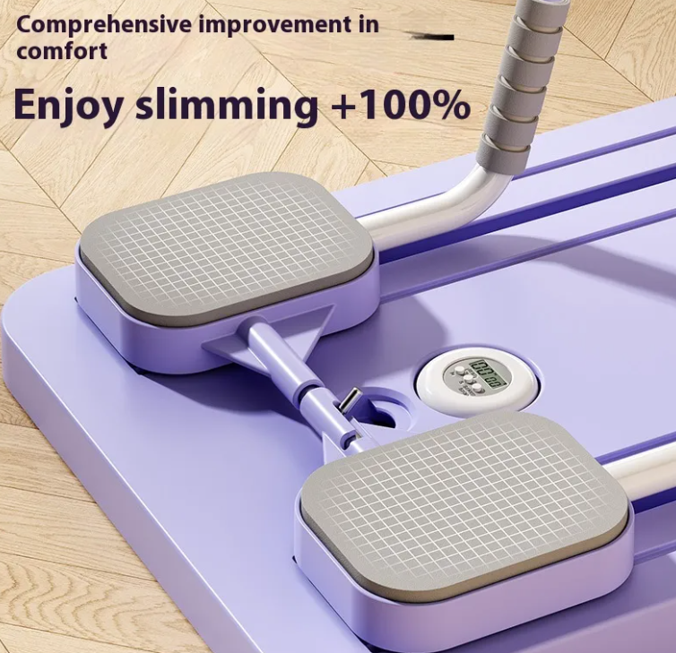 Close-up of the foot pads on a purple abdominal board with a counter display