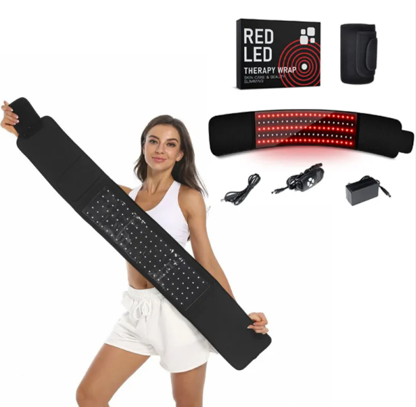 Woman holding the long belt open to show glowing red LEDs, beside the product box, controller and power adapter