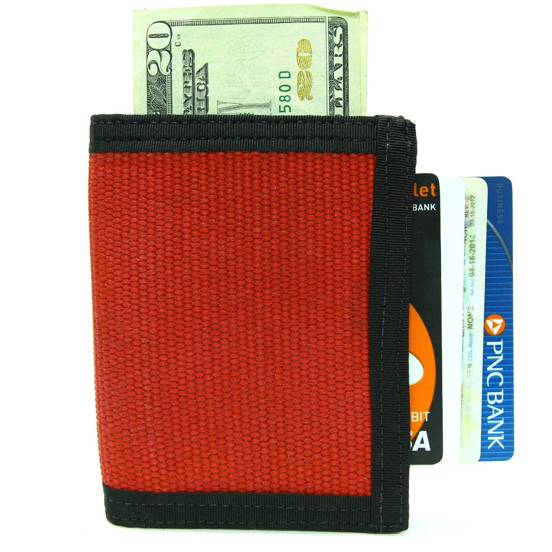 Red Captain Wallet with cash and cards sticking out of the front pocket