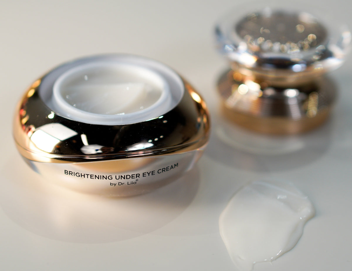 Open EpiLynx eye cream jar at an angle next to its lid on a light surface