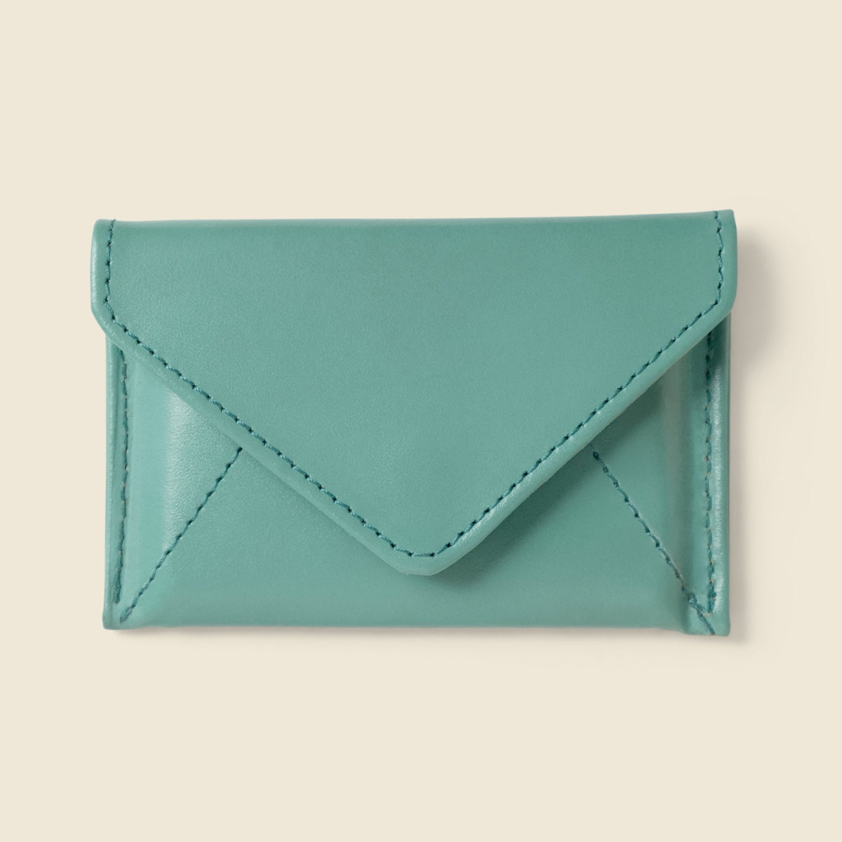 CASUPO mini envelope wallet in teal leather, closed