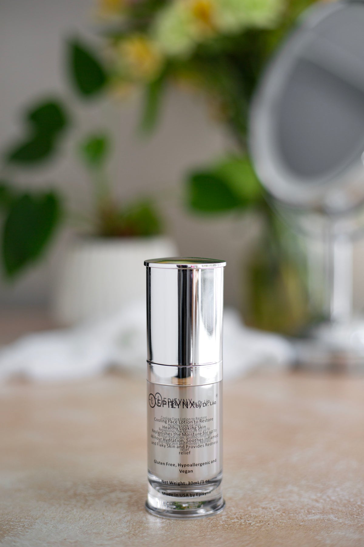 EpiLynx moisturizer bottle on a wooden surface with a blurred plant and mirror behind it