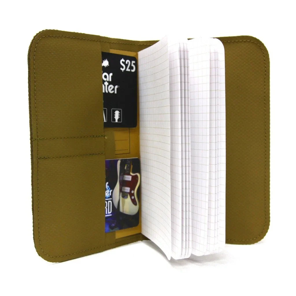 Open coyote Field Notes Wallet holding a notebook and a gift card in the side pockets