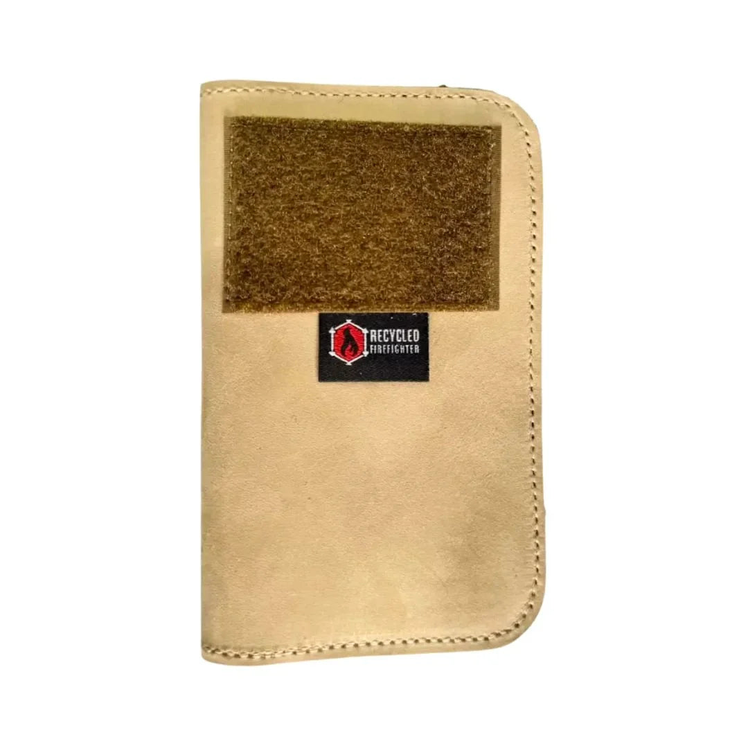Recycled Firefighter Field Notes Wallet in coyote tan leather with a patch panel and small logo tag