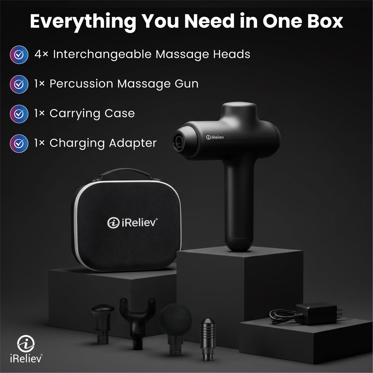 Black massage gun with four heads and a carrying case on dark steps, with the text Everything You Need in One Box