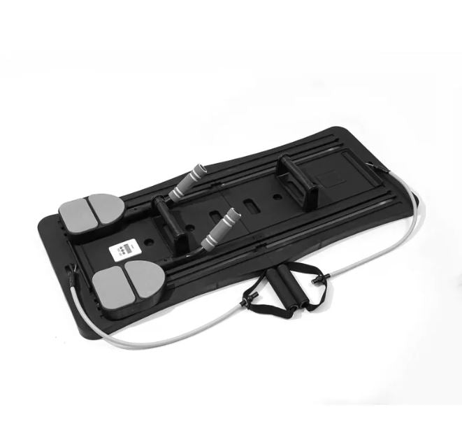 Onyx Black foldable pilates slider board with grey foot pads and resistance bands