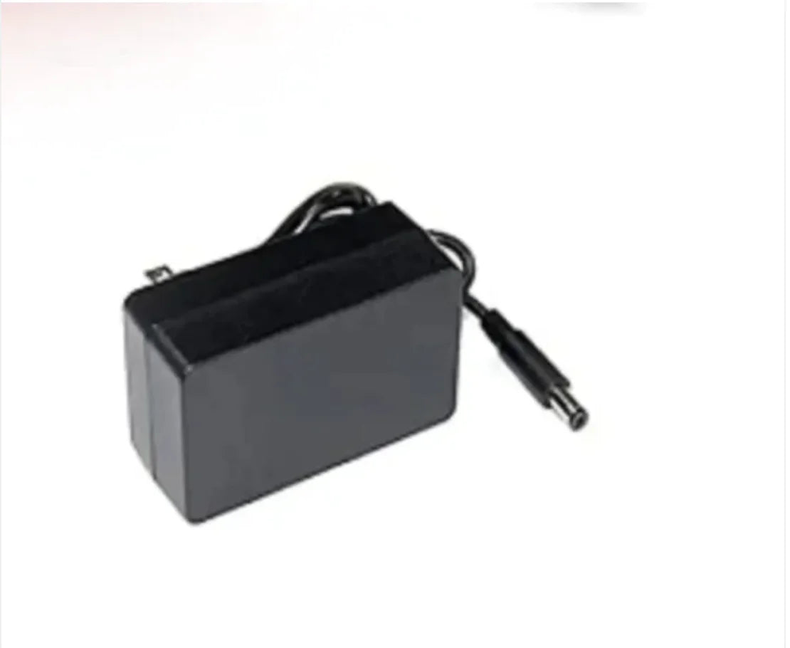 Black power adapter with a coiled cable, front view