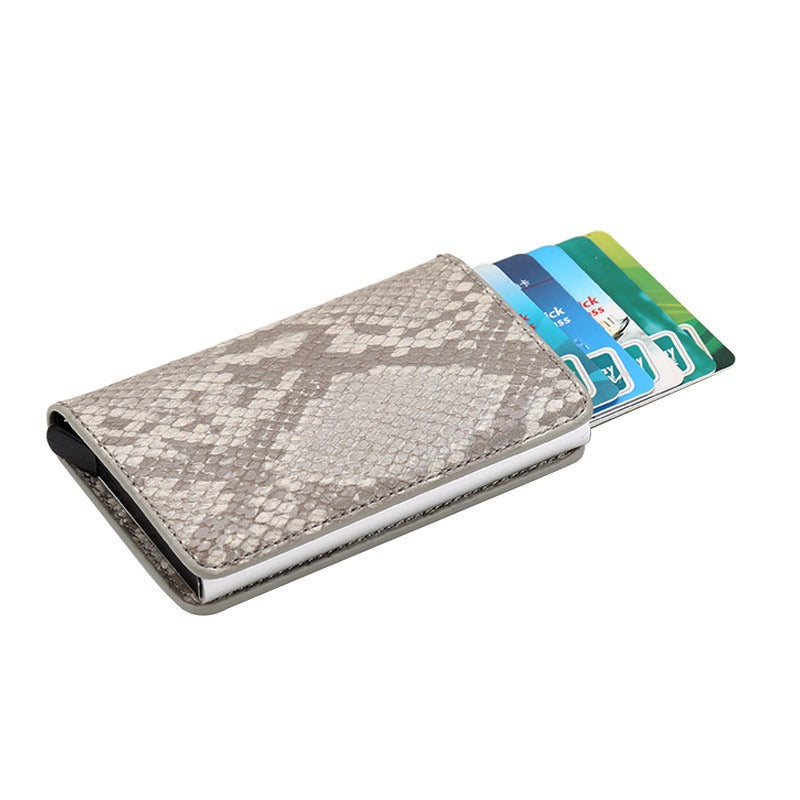 CHICAMOR RFID pop-up card wallet in gray with a snakeskin pattern and cards fanned out
