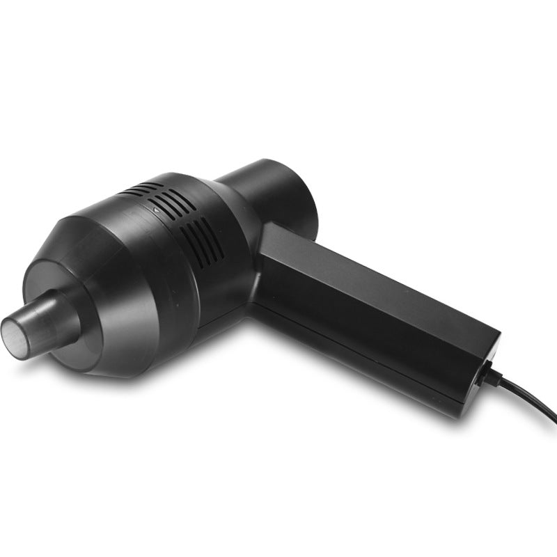 Black mini USB vacuum cleaner with a cable, side view