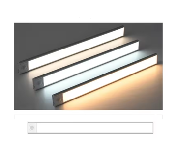 Slim LED light bars glowing in warm and cool white above a single bar with a motion sensor