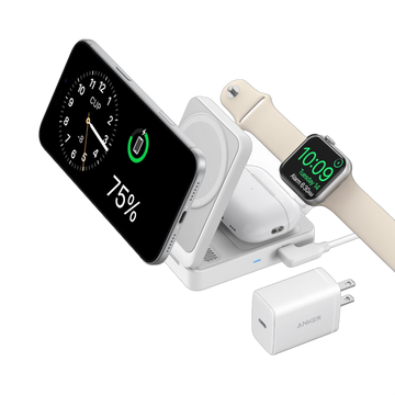 Anker MagGo 3-in-1 Wireless Charging Station in white holding a phone, an earbuds case and an Apple Watch, with a white wall charger