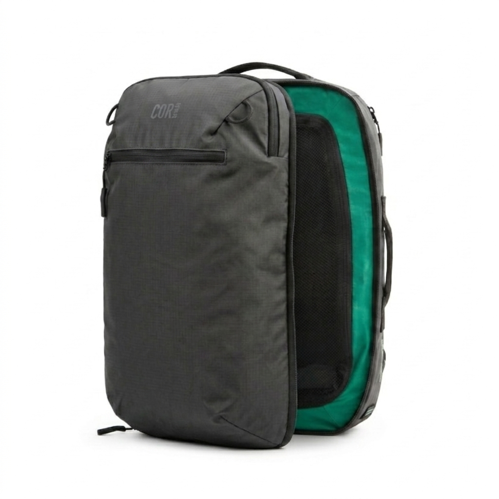 Dark gray backpack opened in clamshell style showing the green interior