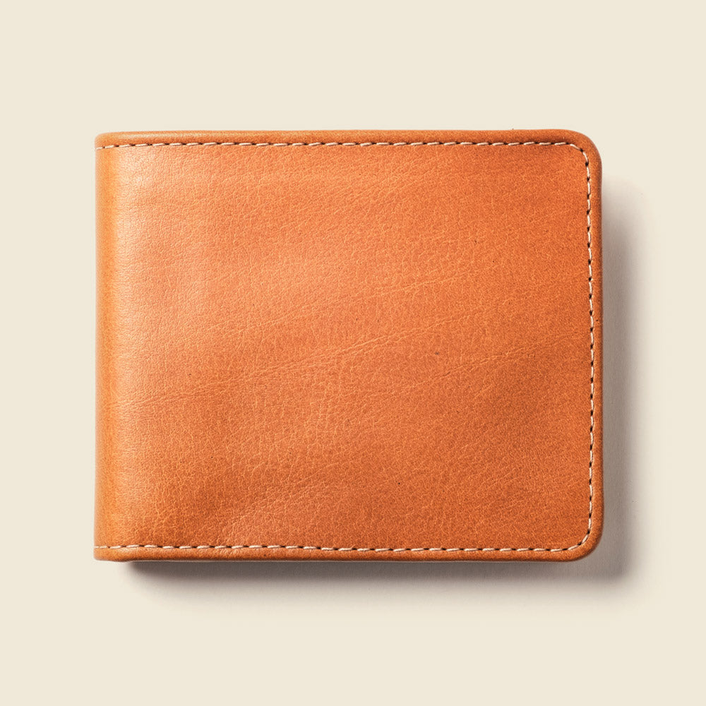 Front of the closed natural tan leather billfold