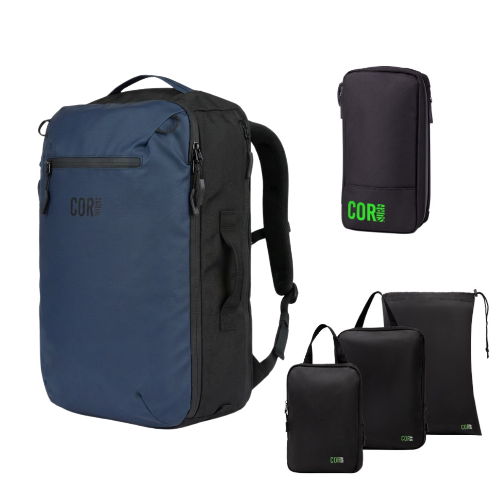 Island Hopper 28L backpack in Midnight Blue with a toiletry bag and three packing pouches