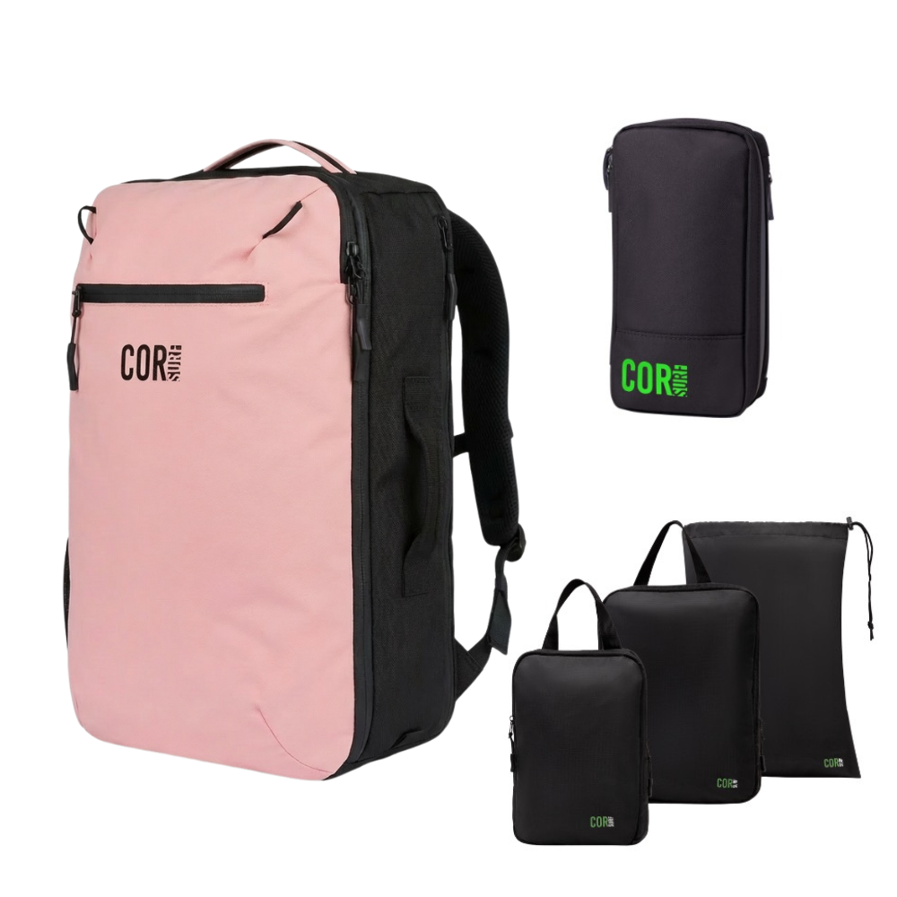 Island Hopper 28L backpack in Pink with a toiletry bag and three packing pouches