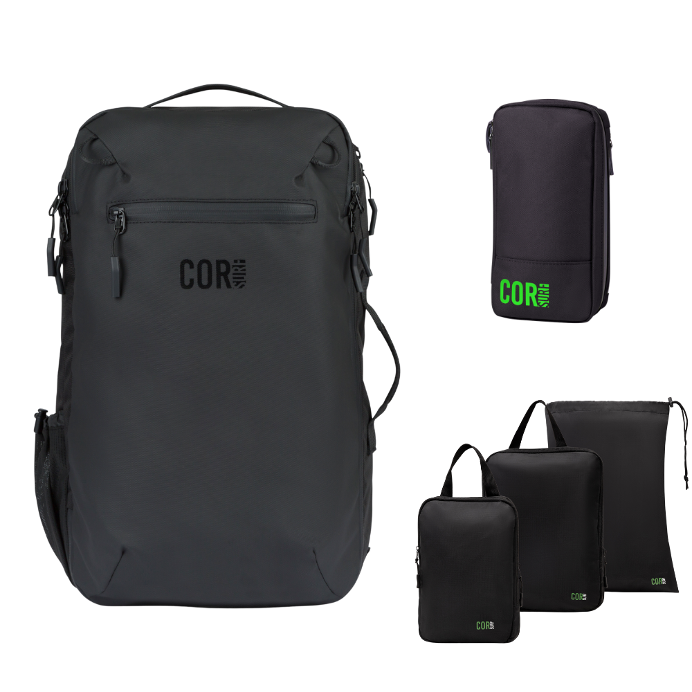 Island Hopper backpack in dark charcoal with a toiletry bag and three packing pouches